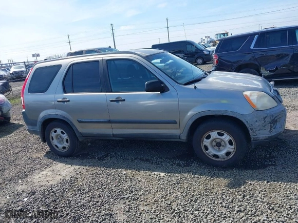 2006 Honda CR-V LX with VIN JHLRD68516C006561, listed as a IAAI auction lot 41855457 with 215,139 mi miles. Bid and sale history available at carsss.com. Image 13.