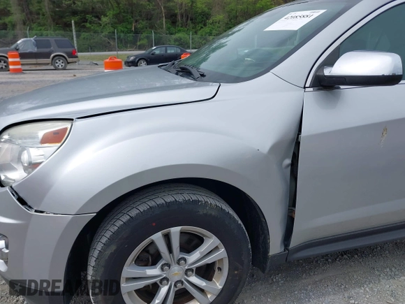 2013 Chevrolet Equinox LTZ z VIN 2GNFLGEK3D6165128, wystawiony jako IAAI lot #42085881 z przebiegiem 120 989 mil mil oraz . Historia ofert i sprzedaży dostępna na DreamBid. Obrazek 6.