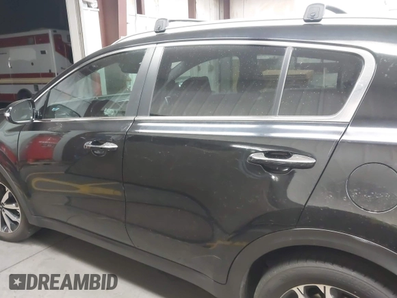 2018 Kia Sportage EX with VIN KNDPN3AC5J7353577, listed as a IAAI auction lot 42058456 with 156,783 mi miles and . Bid and sale history available at DreamBid. Image 14.