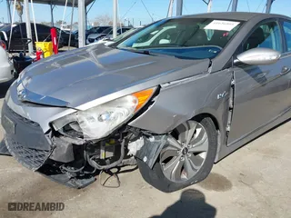 2013 Hyundai Sonata Hybrid with VIN KMHEC4A45DA095642, listed as a IAAI auction lot 41626995 with 183,710 mi miles. Bid and sale history available at carsss.com. Image 6.