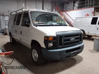 2014 Ford Econoline Cargo Commercial with VIN 1FTNE2EL6EDB13764, listed as a IAAI auction lot 42647684 with 99,876 mi miles and . Bid and sale history available at DreamBid. Image 1.