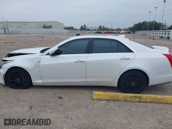 2019 Cadillac CTS RWD with VIN 1G6AP5SX0K0121219, listed as a IAAI auction lot 41239899 with 84,588 mi miles and . Bid and sale history available at DreamBid. Image 14.