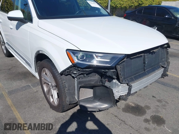 2021 Audi Q7 Premium Plus with VIN WA1LXAF73MD021033, listed as a IAAI auction lot 41814415 with 64,377 mi miles and . Bid and sale history available at DreamBid. Image 6.