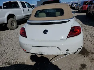 2014 Volkswagen Beetle 1.8T with VIN 3VW517AT4EM818949, listed as a Copart auction lot 49615915 with 103,682 mi miles and Salvage title. Bid and sale history available at DreamBid. Image 6.