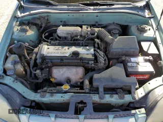 2004 Hyundai Accent GL with VIN KMHCG45C44U533952, listed as a Copart auction lot 51181095 with 88,446 mi miles and Salvage Title. Bid and sale history available at carsss.com. Image 12.