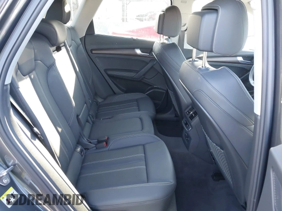 2023 Audi Q5 S line Premium Plus z VIN WA1EAAFY7P2065409, wystawiony jako IAAI lot #41305736 z przebiegiem 15 251 mil mil oraz . Historia ofert i sprzedaży dostępna na DreamBid. Obrazek 8.