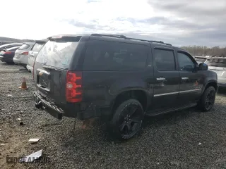 2011 Chevrolet Suburban LTZ with VIN 1GNSKKE38BR228173, listed as a Copart auction lot 49647385 with 225,700 mi miles and Salvage Title. Bid and sale history available at carsss.com. Image 3.