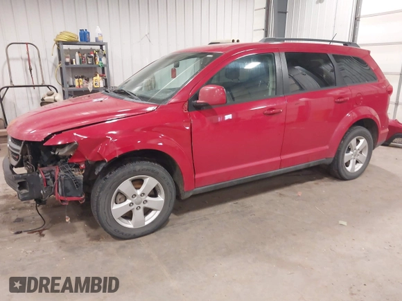 2012 Dodge Journey SXT z VIN 3C4PDDBG4CT397806, wystawiony jako IAAI lot #41333394 z przebiegiem 122 804 mil mil oraz . Historia ofert i sprzedaży dostępna na DreamBid. Obrazek 2.