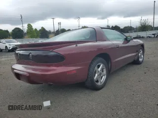 2000 Pontiac Firebird Firebird z VIN 2G2FS22K6Y2143127, wystawiony jako Copart lot #72041384 z przebiegiem 181 787 mil mil oraz Szkoda całkowita • Salvage title. Historia ofert i sprzedaży dostępna na DreamBid. Obrazek 3.