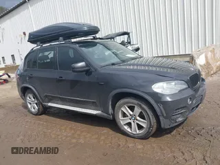 2013 BMW X5 xDrive35i z VIN 5UXZV4C57DL992812, wystawiony jako IAAI lot #41923925 z przebiegiem 143 465 mil mil oraz . Historia ofert i sprzedaży dostępna na DreamBid. Obrazek 1.