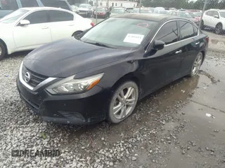 2016 Nissan Altima SL with VIN 1N4BL3AP6GC126424, listed as a IAAI auction lot 42416614 with 102,397 mi miles and . Bid and sale history available at DreamBid. Image 2.