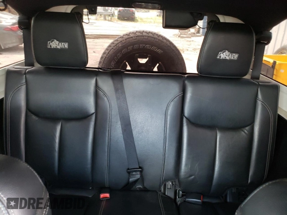 2013 Jeep Wrangler Unlimited Rubicon 10th Anniversary with VIN 1C4HJWFGXDL543660, listed as a Copart auction lot 61462104 with 115,897 mi miles and Salvage title. Bid and sale history available at DreamBid. Image 10.