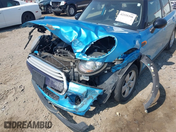 2015 MINI Hardtop 4 Door with VIN WMWXS5C56FT831505, listed as a IAAI auction lot 42155398 with 95,693 mi miles and . Bid and sale history available at DreamBid. Image 6.