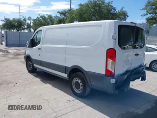 2015 Ford Transit Cargo with VIN 1FTNE1ZM2FKA78621, listed as a IAAI auction lot 41654632 with 234,709 mi miles and . Bid and sale history available at carsss.com. Image 3.