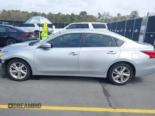 2014 Nissan Altima SL with VIN 1N4AL3AP4EC167420, listed as a IAAI auction lot 41815803 with 185,259 mi miles and . Bid and sale history available at DreamBid. Image 14.