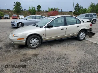 2002 Saturn SL with VIN 1G8ZH52882Z223024, listed as a Copart auction lot 55672635 with 85,412 mi miles and Salvage title. Bid and sale history available at DreamBid. Image 1.