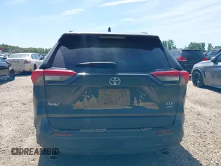 2021 Toyota RAV4 XLE with VIN 2T3P1RFV1MC214257, listed as a IAAI auction lot 42297014 with Not provided miles and . Bid and sale history available at DreamBid. Image 16.