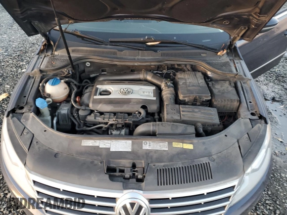 2013 Volkswagen CC Sport with VIN WVWBP7ANXDE539872, listed as a Copart auction lot 79144084 with 128,050 mi miles and Salvage Title. Bid and sale history available at DreamBid. Image 13.