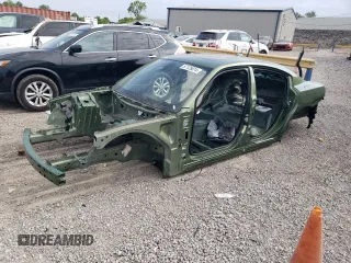 2020 Dodge Charger Scat Pack Widebody z VIN 2C3CDXGJ2LH228241, wystawiony jako Copart lot #57125074 z przebiegiem Nie podano mil oraz Nie do naprawy • Non repairable. Historia ofert i sprzedaży dostępna na DreamBid. Obrazek 1.