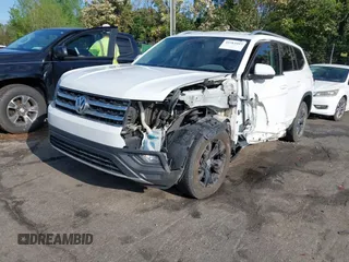 2018 Volkswagen Atlas SE with VIN 1V2CR2CAXJC548220, listed as a IAAI auction lot 41983957 with 118,371 mi miles and . Bid and sale history available at DreamBid. Image 2.