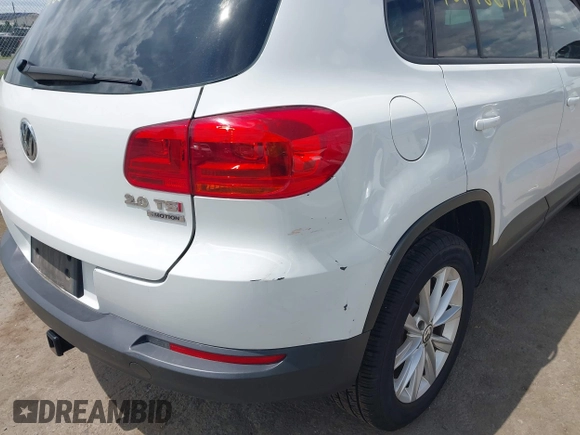 2014 Volkswagen Tiguan S with VIN WVGBV3AX0EW589381, listed as a IAAI auction lot 42186999 with 144,137 mi miles and . Bid and sale history available at DreamBid. Image 17.