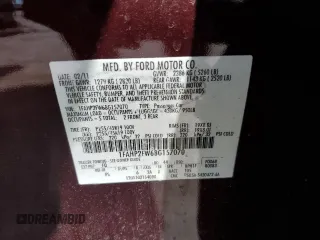 2011 Ford Taurus Limited with VIN 1FAHP2FW6BG157070, listed as a Copart auction lot 59300415 with 143,314 mi miles and Salvage title. Bid and sale history available at DreamBid. Image 13.