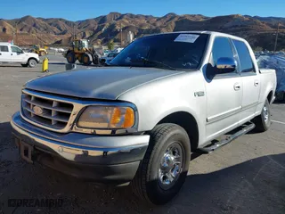2002 Ford F-150 XLT with VIN 1FTRW07L12KA31478, listed as a IAAI auction lot 41289240 with 277,605 mi miles. Bid and sale history available at carsss.com. Image 18.