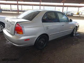 2003 Hyundai Accent GL with VIN KMHCG45C93U476176, listed as a IAAI auction lot 41940608 with 212,264 mi miles. Bid and sale history available at carsss.com. Image 4.