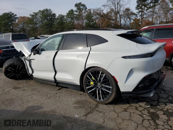 2023 Aston Martin DBX 707 z VIN SD7VUJBW6PTV05731, wystawiony jako Copart lot #84591074 z przebiegiem Nie podano mil oraz Szkoda całkowita • Salvage title. Historia ofert i sprzedaży dostępna na DreamBid. Obrazek 2.