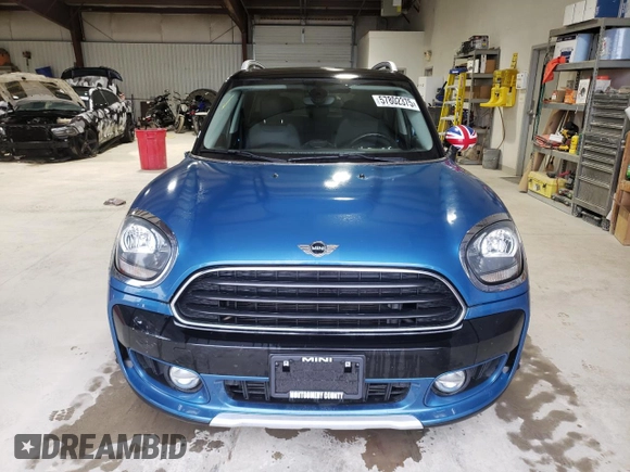 2018 MINI Countryman Cooper с VIN WMZYV5C31J3E04614, выставлен на аукционе Copart как лот 57802375 с пробегом 121 302 миль миль и Списание • Salvage title. История ставок и продаж доступна на DreamBid. Изображение 5.