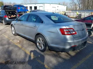 2013 Ford Taurus SEL with VIN 1FAHP2E8XDG191132, listed as a IAAI auction lot 41833542 with 165,125 mi miles. Bid and sale history available at carsss.com. Image 3.