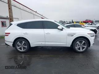 2021 Genesis GV80 with VIN KMUHCESC2MU052594, listed as a IAAI auction lot 41273763 with 19,190 mi miles and . Bid and sale history available at DreamBid. Image 13.
