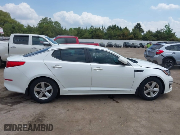 2015 Kia Optima LX z VIN KNAGM4A70F5649084, wystawiony jako IAAI lot #42231976 z przebiegiem 152 545 mil mil oraz . Historia ofert i sprzedaży dostępna na DreamBid. Obrazek 13.
