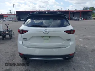 2021 Mazda CX-5 Signature with VIN JM3KFBEY0M0436264, listed as a IAAI auction lot 41568892 with 36,833 mi miles. Bid and sale history available at carsss.com. Image 16.