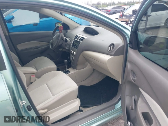 2010 Toyota Yaris with VIN JTDBT4K32A4070723, listed as a IAAI auction lot 42011968 with 71,950 mi miles and . Bid and sale history available at carsss.com. Image 5.