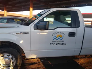 2014 Ford F-150 XL with VIN 1FTMF1CM4EKE98669, listed as a IAAI auction lot 41310314 with 133,239 mi miles. Bid and sale history available at carsss.com. Image 14.