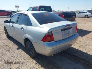 2007 Ford Focus S with VIN 1FAHP34N37W289507, listed as a IAAI auction lot 42632851 with 159,806 mi miles and . Bid and sale history available at DreamBid. Image 3.