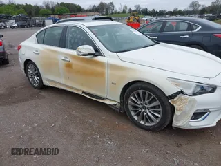 2019 Infiniti Q50 Luxe with VIN JN1EV7AP9KM513046, listed as a IAAI auction lot 41904330 with 51,608 mi miles and . Bid and sale history available at DreamBid. Image 6.