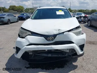 2017 Toyota RAV4 LE with VIN JTMZFREV2HJ711557, listed as a IAAI auction lot 41894094 with 167,645 mi miles. Bid and sale history available at carsss.com. Image 6.