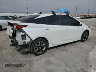 2021 Toyota Prius L Eco with VIN JTDKAMFUXM3149396, listed as a Copart auction lot 61874195 with 126,473 mi miles and Salvage title. Bid and sale history available at DreamBid. Image 3.