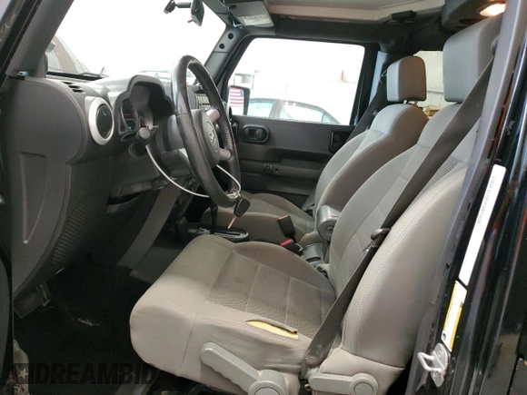 2008 Jeep Wrangler Unlimited Sahara with VIN 1J4GA59108L637009, listed as a Copart auction lot 63333705 with 181,778 mi miles and Clean title. Bid and sale history available at DreamBid. Image 7.