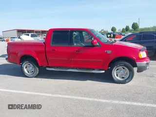 2003 Ford F-150 XLT with VIN 1FTRW08L43KD14456, listed as a IAAI auction lot 42098830 with 234,908 mi miles. Bid and sale history available at carsss.com. Image 14.