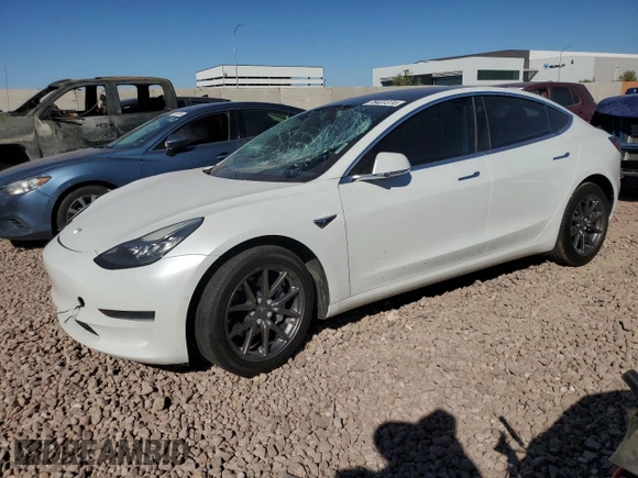 2020 Tesla Model 3 Standard Range Plus with VIN 5YJ3E1EA4LF799597, listed as a Copart auction lot 76401374 with 77,506 mi miles and Salvage Title. Bid and sale history available at DreamBid. Image 1.