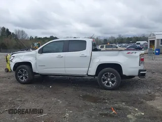 2020 Chevrolet Colorado 4WD Z71 with VIN 1GCGTDEN6L1228309, listed as a IAAI auction lot 41865357 with 100,560 mi miles and . Bid and sale history available at DreamBid. Image 14.