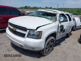 2013 Chevrolet Tahoe LT with VIN 1GNSCBE07DR372979, listed as a IAAI auction lot 42281955 with 214,737 mi miles and . Bid and sale history available at DreamBid. Image 2.