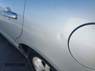 2004 Kia Amanti z VIN KNALD124645031511, wystawiony jako IAAI lot #42036901 z przebiegiem 218 926 mil mil oraz . Historia ofert i sprzedaży dostępna na DreamBid. Obrazek 13.