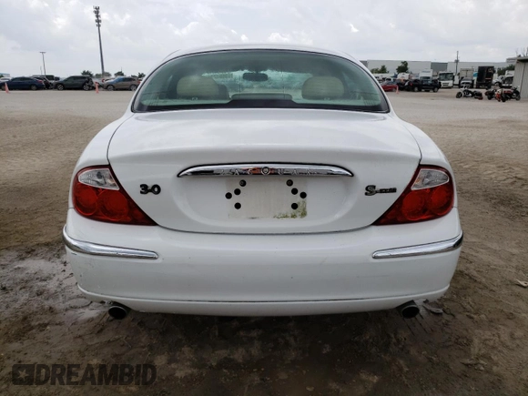 2000 Jaguar S-Type V6 z VIN SAJDA01C0YFL51640, wystawiony jako Copart lot #48708915 z przebiegiem 186 034 mil mil oraz Nie do naprawy • Non repairable. Historia ofert i sprzedaży dostępna na DreamBid. Obrazek 6.