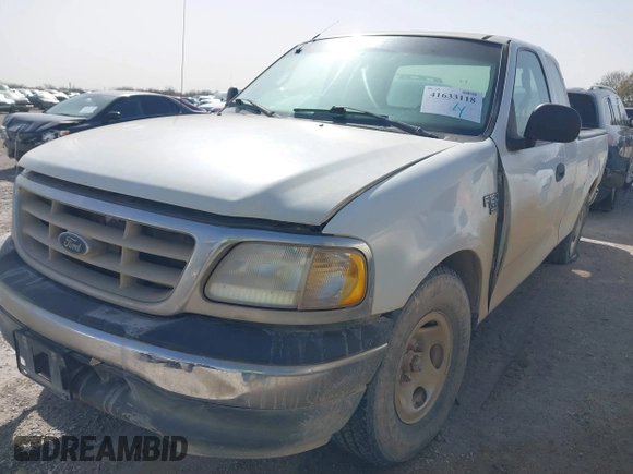 2000 Ford F-150 XL with VIN 1FTRX17W6YNC32992, listed as a IAAI auction lot 41633118 with 174,989 mi miles. Bid and sale history available at carsss.com. Image 2.