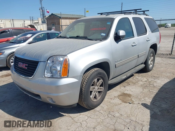 2013 GMC Yukon SLT with VIN 1GKS1CE09DR268602, listed as a IAAI auction lot 41992325 with 167,476 mi miles. Bid and sale history available at carsss.com. Image 17.