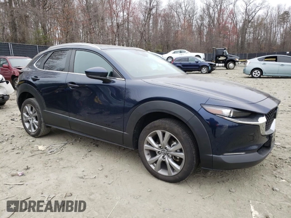 2023 Mazda CX-30 S Carbon Edition with VIN 3MVDMBCM5PM507711, listed as a Copart auction lot 48982325 with 42,759 mi miles and Salvage Title. Bid and sale history available at carsss.com. Image 4.